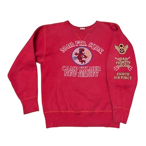 May include: A red crewneck sweatshirt with the text "364th FTR. SQDN. CAMP KILMER NEW JERSEY" and a cartoon devil graphic. The right sleeve features a patch with the text "364th FIGHTER GROUP EIGHTH AIR FORCE".