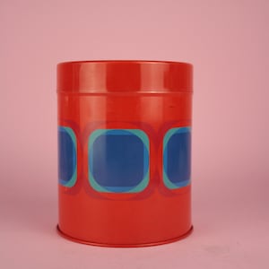 vintage tin can orange red blue old can OP Art vintage stock