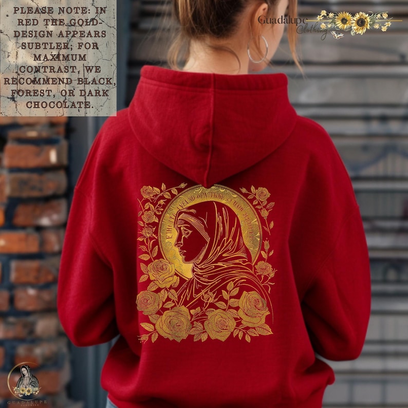 May include: A red hooded sweatshirt with a gold design on the back. The design features a religious figure surrounded by roses and text. The text on the back reads "I BELIEVE IN THE POWER OF PRAYER".