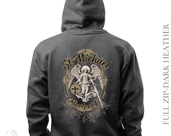 May include: Dark gray unisex full zip hoodie with a graphic of St. Michael. The graphic features an angel with wings, a sword, and the text "St. Michael Protect U". The hoodie is made of dark heather material.