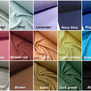 Puede incluir: Una colecci&oacute;n de 15 muestras de tela en varios colores, incluyendo menta clara, menta, lavanda, azul marino, azul real, magenta, rojo marr&oacute;n, melocot&oacute;n, amarillo claro, azul brillante, beige gris, marr&oacute;n, arena, verde oscuro y negro.