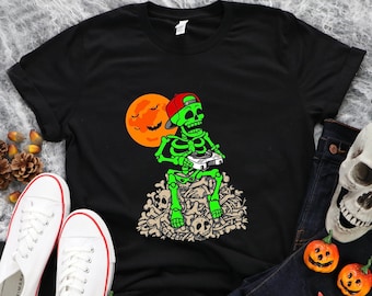 Cute Halloween Skeleton  Game boy Shirt, Halloween Shirt, Funny boys gamer Halloween kids shirt, Trick or Skeleton playing games on bones