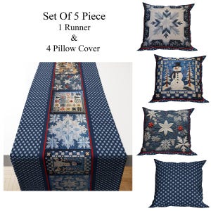 Puede incluir: Un juego de 5 piezas de decoración para el hogar con temática invernal, que incluye un camino de mesa y cuatro fundas de cojín. El camino de mesa presenta un fondo azul con diseños de copos de nieve y muñecos de nieve.
