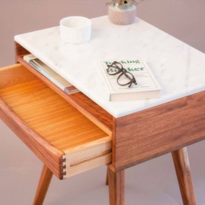 Wooden nightstand Rustic nightstand Modern nightstand Bedroom furniture One-drawer nightstand Side table Nightstand with drawer Handcrafted nightstand Wood nightstand Small nightstand Minimalist nightstand Vintage nightstand Bedside cabinet