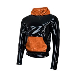 May include: A black, glossy hoodie with an orange hood and pocket. The pocket features an ornate, patterned design. The hoodie has a zipper at the neckline and long sleeves. The material appears to be a shiny, synthetic fabric.