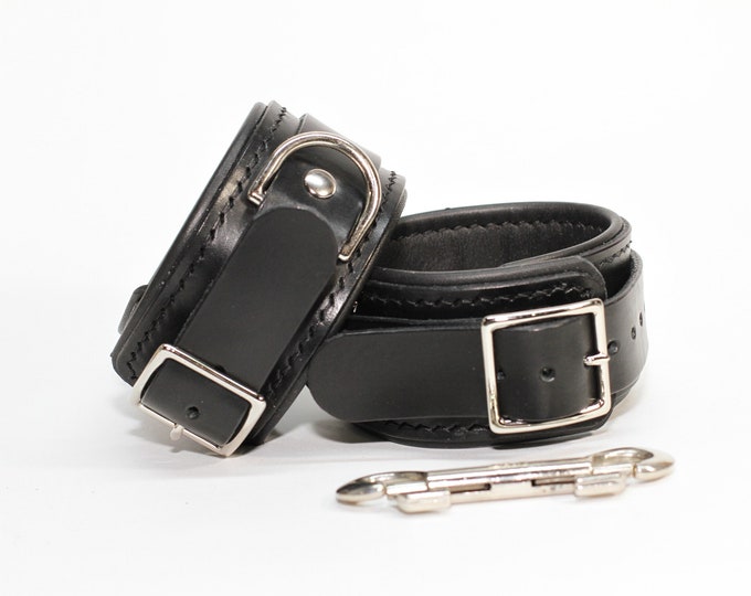 Leather wrist cuffs  Bondage and restraint leather cuffs