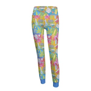 May include: Colourful leggings with a pattern of cartoon marijuana leaves, pipes, and lighters. The leggings are blue, yellow, pink, and green.
