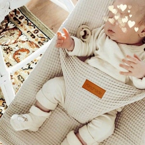 Copertura per amaca Babybjorn Waffle si posiziona sopra l'originale, non la sostituisce immagine 1