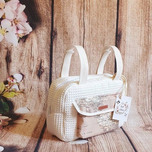 Kinderwagentasche, Organizer für Kinderwagen oder leichte Kinderwagen – Cremefarbene Waffel/beige Weltkarte