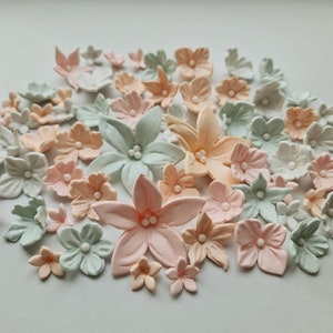 50 pcs. Edible sugar fondant flowers cake cupcake topper decorations. Light pastel colors