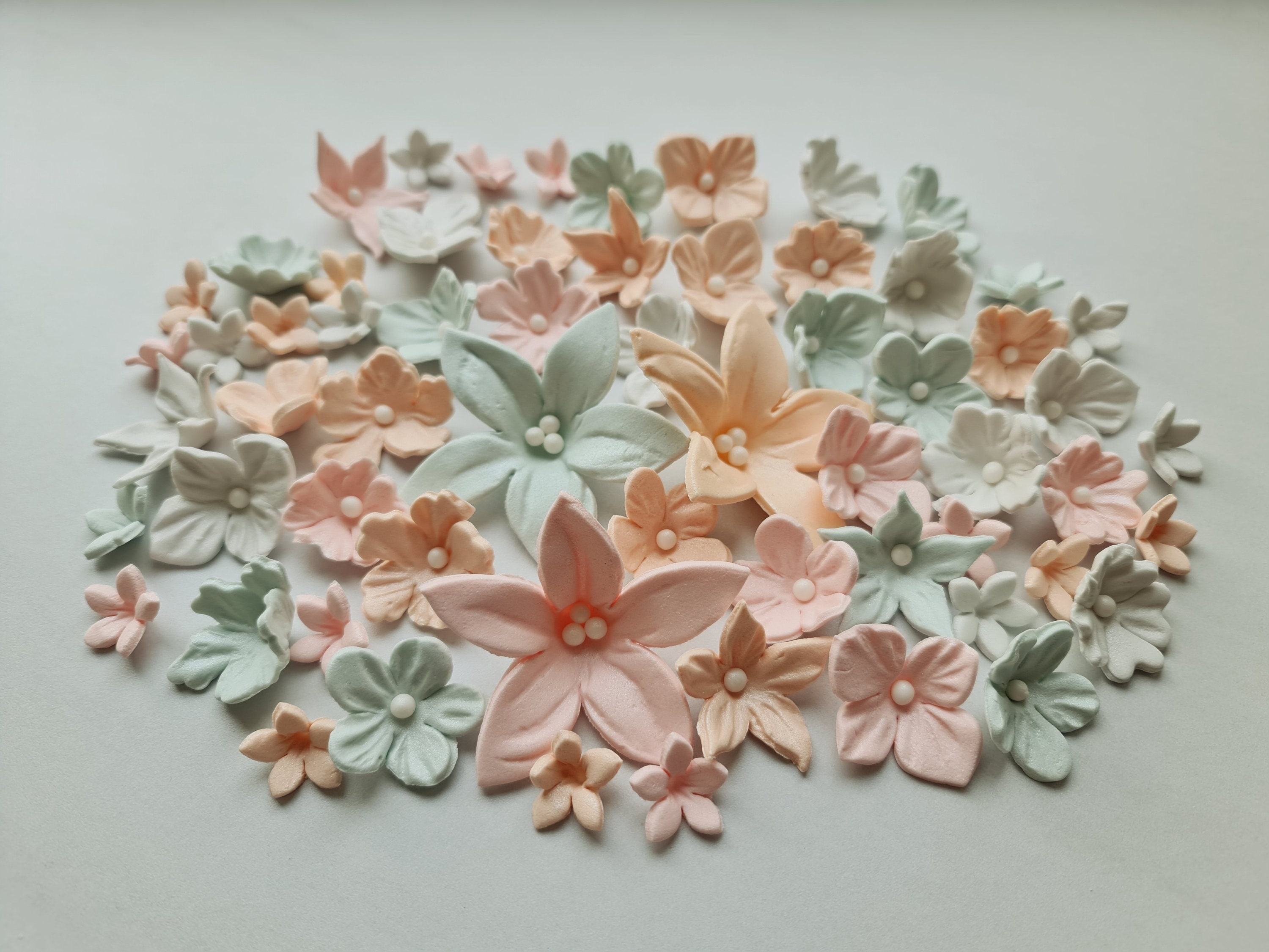 50 pcs. Edible sugar fondant flowers cake cupcake topper decorations. Light pastel colors