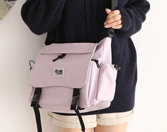 messenger backpack for school