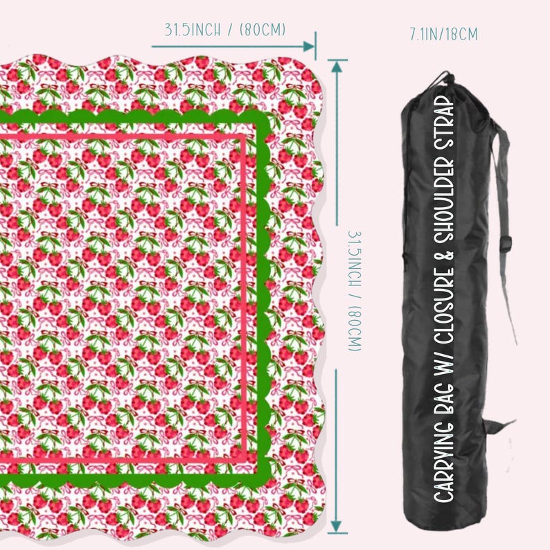 May include: A strawberry-print mat, 80 cm long, with a green and pink border. It comes with a black carrying bag with a shoulder strap. The mat has a scalloped edge and is 18 cm wide. Text reads: CARRYING BAG W/ CLOSURE & SHOULDER STRAP.
