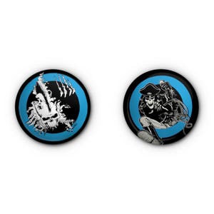May include: Two round black and blue buttons with skull graphics. One button features a skull with claw marks, the other depicts a skeleton pirate holding a whip. The buttons have a black border and a light blue background.