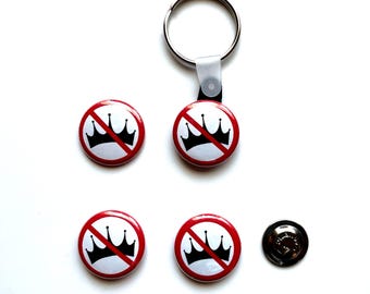 No Kings Crossed Out Crown Button Pack (1) pinback Button, (1) magnet Button, (1) clothing magnet Button and a Button Keychain!