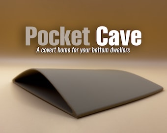 Jaskinia kieszonkowa w akwarium – tajne schronienie dla mieszkańców dna akwarium.