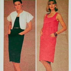 May include: A black knee-length dress with a thin belt and a short-sleeved white cropped jacket, alongside a sleeveless knee-length red dress with two front pockets. Both garments feature a simple, straight-cut silhouette and solid colors.