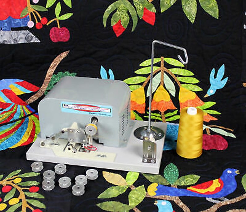 Electric High Speed Bobbin Winder Adjusts to most sewing machine Electric High Speed Bobbin Winder Adjusts to most sewing machine