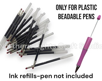 May include: A collection of black ink pen refills with clear plastic caps and a single pink beadable pen. Text on the image reads: ONLY FOR PLASTIC BEADABLE PENS and Ink refills-pen not included. Northern Lights Craft Studio is also visible.
