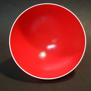 Original African ostrich egg shell suitable as a side dish, for nibbles, etc. Motif red inside