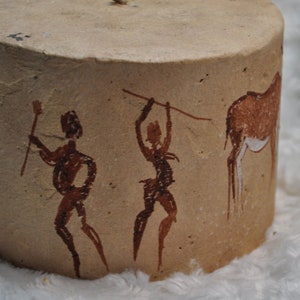 Original African candle with Africa motif in pillar shape, extra large, round and flat