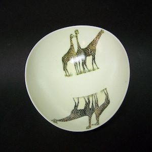 Original African ostrich egg shell suitable as a side dish, motif giraffes inside