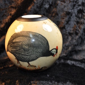 African tealight with motif, very nicely patterned Bamboo fruit hard shell Guinea Fowl