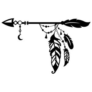 May include: A black silhouette graphic of an arrow featuring a pointed tip, a fletched end, and hanging decorative elements including a crescent moon, small beads, tassels, stars, and three large feathers suspended from the shaft.
