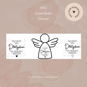 May include: A black and white angel design with the text "DU HAST EIN Plätzchen IN MEINEM HERZEN" is displayed on a white rectangle. The image also includes the words "SVG Laserdatei Gravur" and "PLÄTZCHEN IM HERZEN".