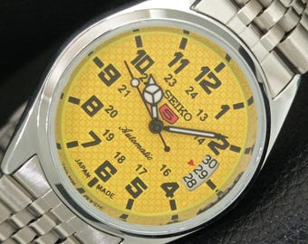 Reloj de pulsera Seiko 5 automático vintage reacondicionado, fabricado en Japón, modelo 6309a, para hombre, con fecha, esfera amarilla, parte trasera transparente y correa Jubilee (a443701-1).