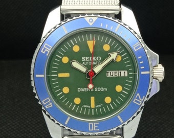 Vintage refurbished Seiko diver style automatic 6309a Japan mens day/date green dial watch movable bezel a287114-10