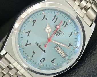 Vintage Seiko 5 automatisch Japan 6309a gerenoveerd Arabisch figuur hemelsblauwe kleur wijzerplaat transparante achterkant jubileum band horloge a443620-1