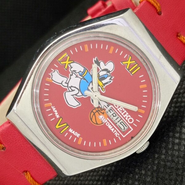 Vintage Seiko cartoon dial automatic 6319a Japan mens day/date red dial watch 605-a314240-4