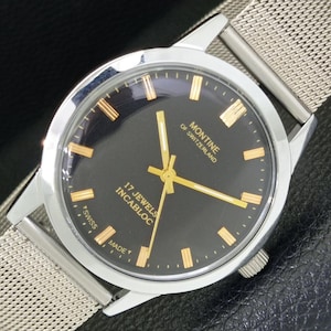 Vintage Montine of Switzerland 17 Jewels Incabloc Hand-Winding Mens Black Color Dial Wrist Watch a285410-1