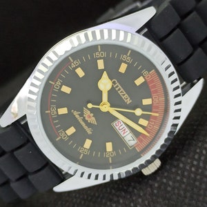 Vintage refurbished Citizen automatic 8200 Japan mens day/date black dial watch 557a-a295474-1