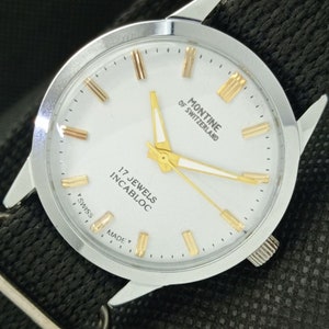 Vintage Montine of Switzerland 17 jewels incabloc winding mens white dial watch a285414-1