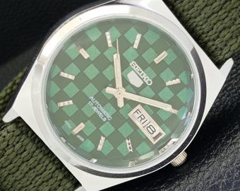 Vintage Seiko 5 automatisch 6309a Japan heren gerenoveerd dag/datum groene kleur wijzerplaat transparante achterkant polshorloge a440228-1