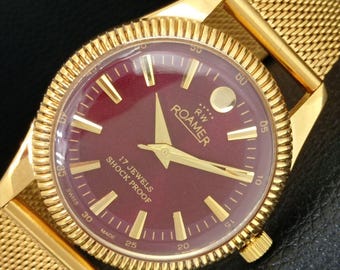 Reloj de pulsera vintage Roamer de cuerda manual para hombre, suizo, reacondicionado, con esfera color granate, a707389-1