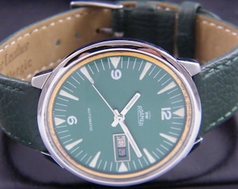 Reloj automático suizo Roamer Mustang vintage para hombre con día/fecha, esfera verde, A52979-1