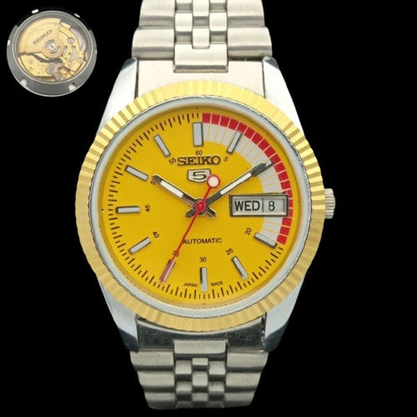 Vintage Seiko transparent back Japan mens day/date automatic yellow dial watch 575b-a305015-1