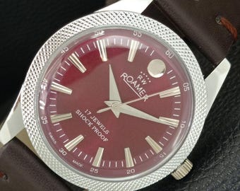 Vintage Roamer handopwindbaar Zwitsers herenhorloge met kastanjebruine kleur wijzerplaat a707153-1