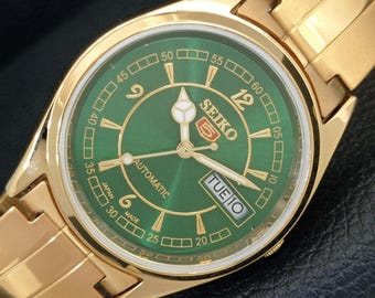 Vintage Seiko 5 automatisch 6309a gerenoveerd Japan heren dag/datum groene kleur wijzerplaat transparante achterkant vergulde polshorloge a443474-1