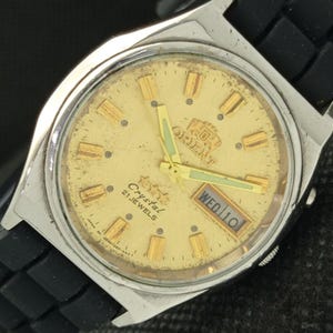 Elegant Old Orient Crystal Japan Mens Date Automatic 46943
