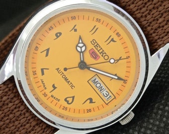 Vintage refurbished Seiko 5 automatic 6309a Japan mens day/date arabic yellow dial watch 610e-a318752-4