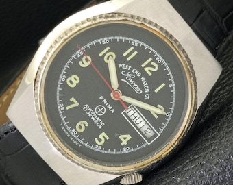 Vintage automatic west end watch co swiss mens day&date black dial watch a600062-a
