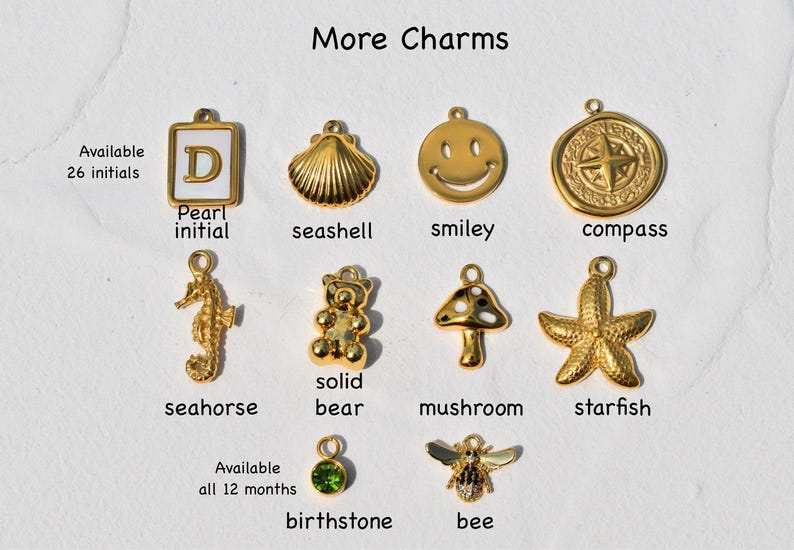 a bunch of charms that are on a piece of paper