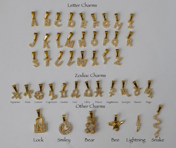 LIGHTNING CHARM GOLD W/CRYSTALS LIGHTNING CHARM GOLD W/CRYSTALS