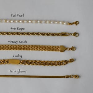 a collection of five gold-colored bracelets, each with a different design and clasp style, arranged in a row.