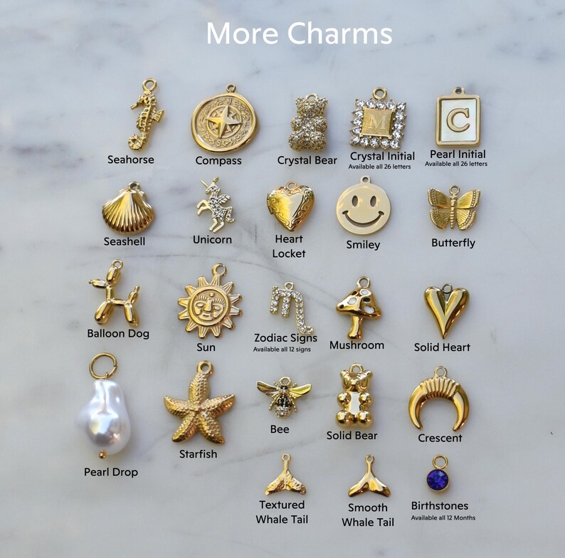 a bunch of different types of earrings on a table