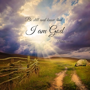 May include: A scenic landscape with a dirt track leading through a field with a wooden fence. The sky is filled with clouds and a bright light shines through the clouds. The text "Be still and know that I am God Psalm 46:10" is written on the clouds.